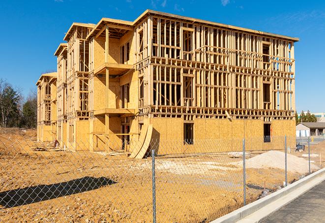 a snapshot of temporary chain link fences protecting a large construction project from unauthorized access in Cambridge OH